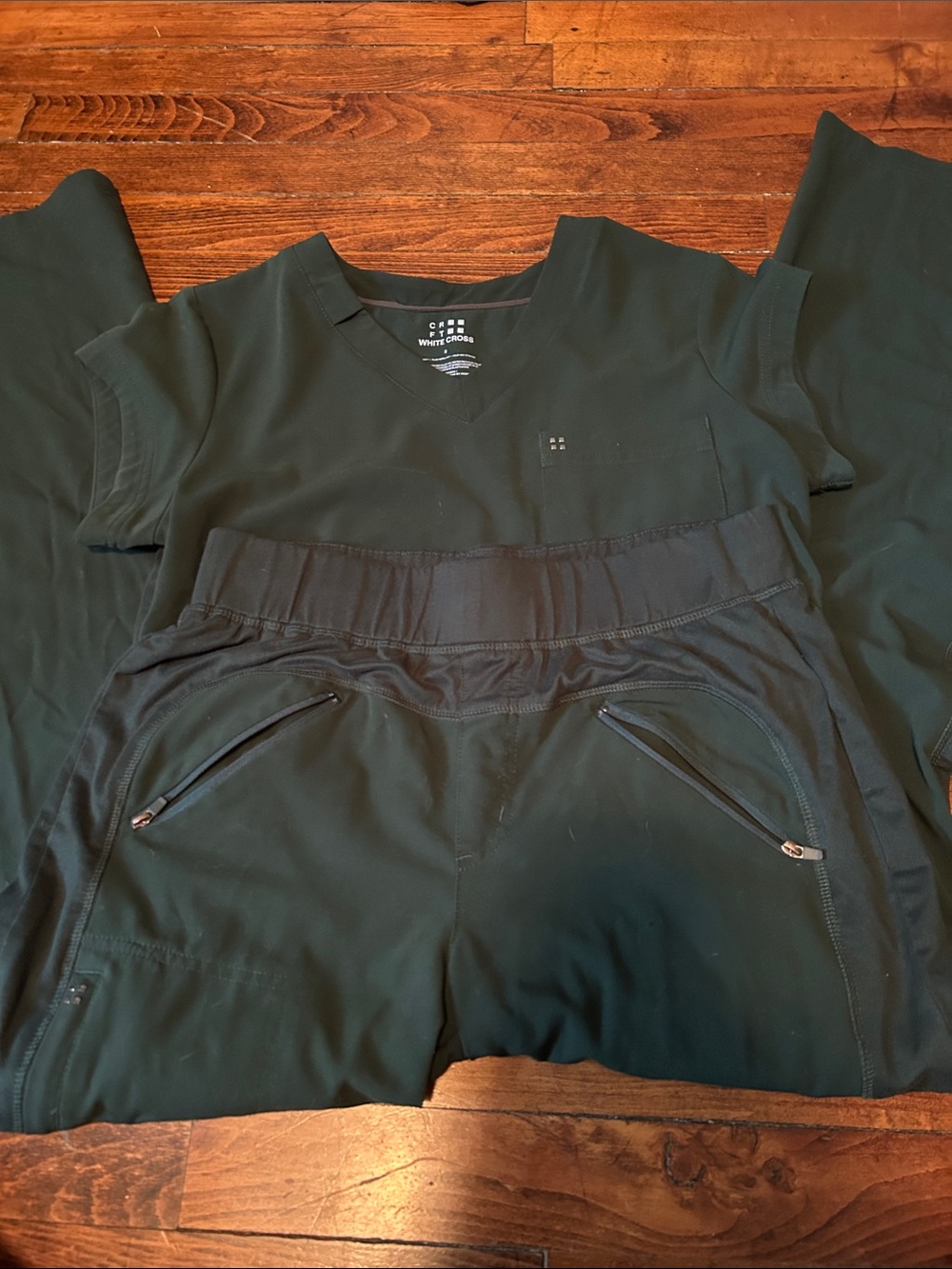 White cross scrub set in dark green